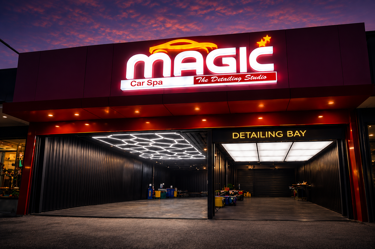 Magic Car Spa detailing studio storefront at dusk with illuminated signage and detailing bay